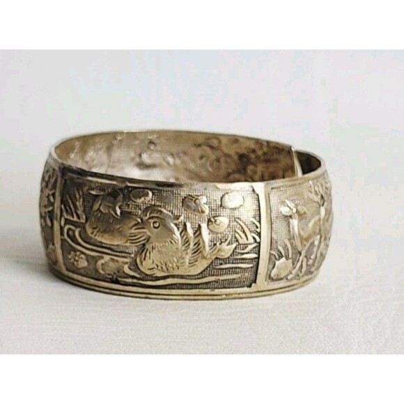 Unbranded Jewelry - Miao Silver Tone Bangle with repoussé Depicting Birds and Deer In Nature Vintage
